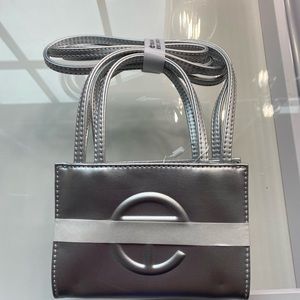 Brand new sliver Telfar bag